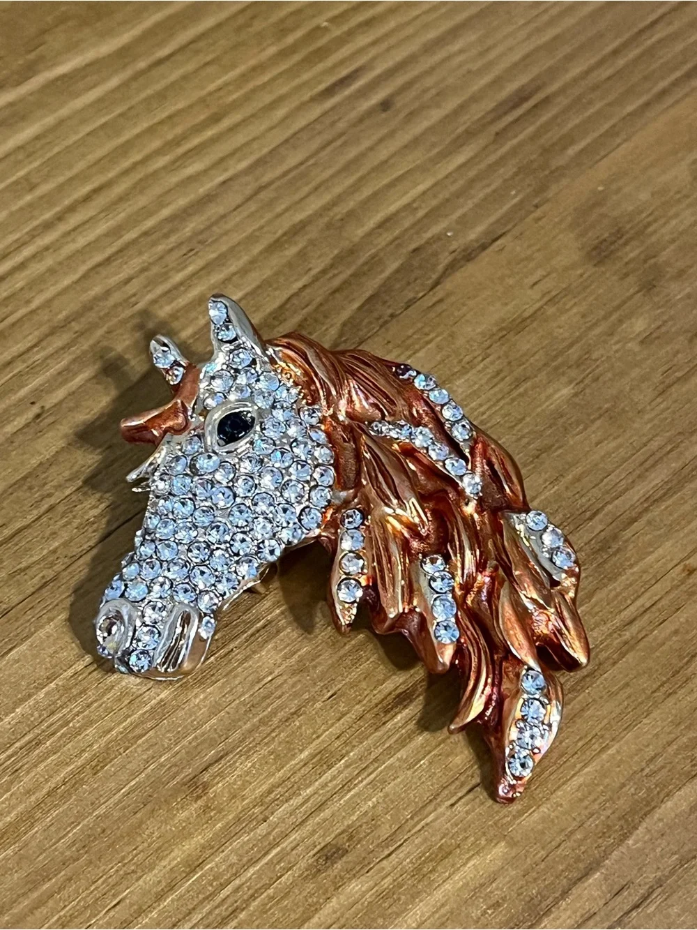 None this brooch